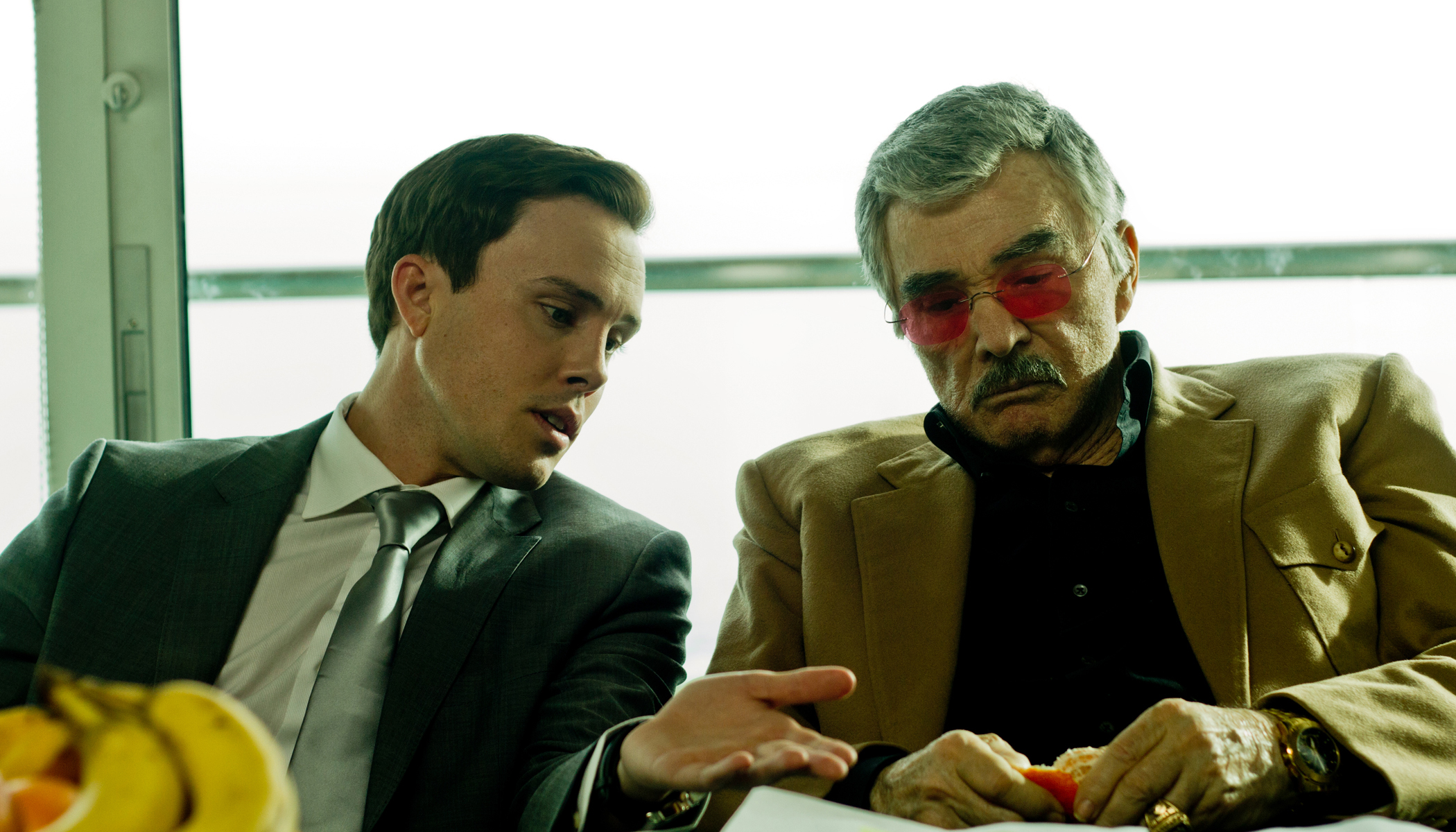 Burt Reynolds and Logan Fahey on set of 