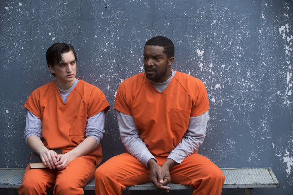 Still of Roger R. Cross and Richard Harmon in Continuum (2012)
