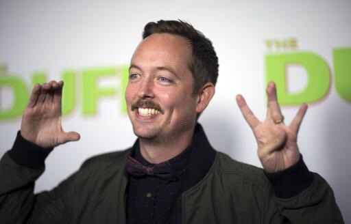 Chris Wylde throwing his CW's up at the Duff premiere