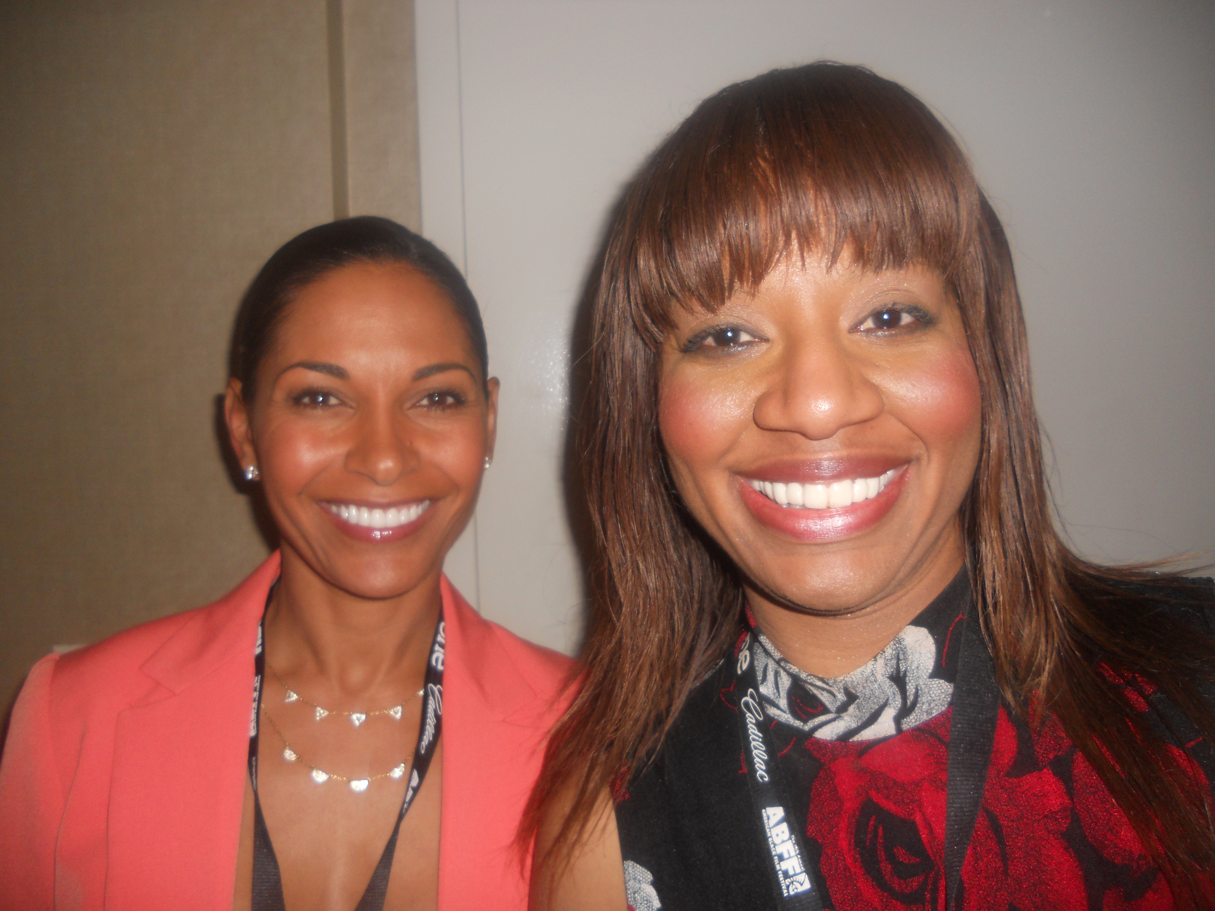 Nicole takes a photo with actress Salli Richardson-Whitfield at the American Black Film Festival