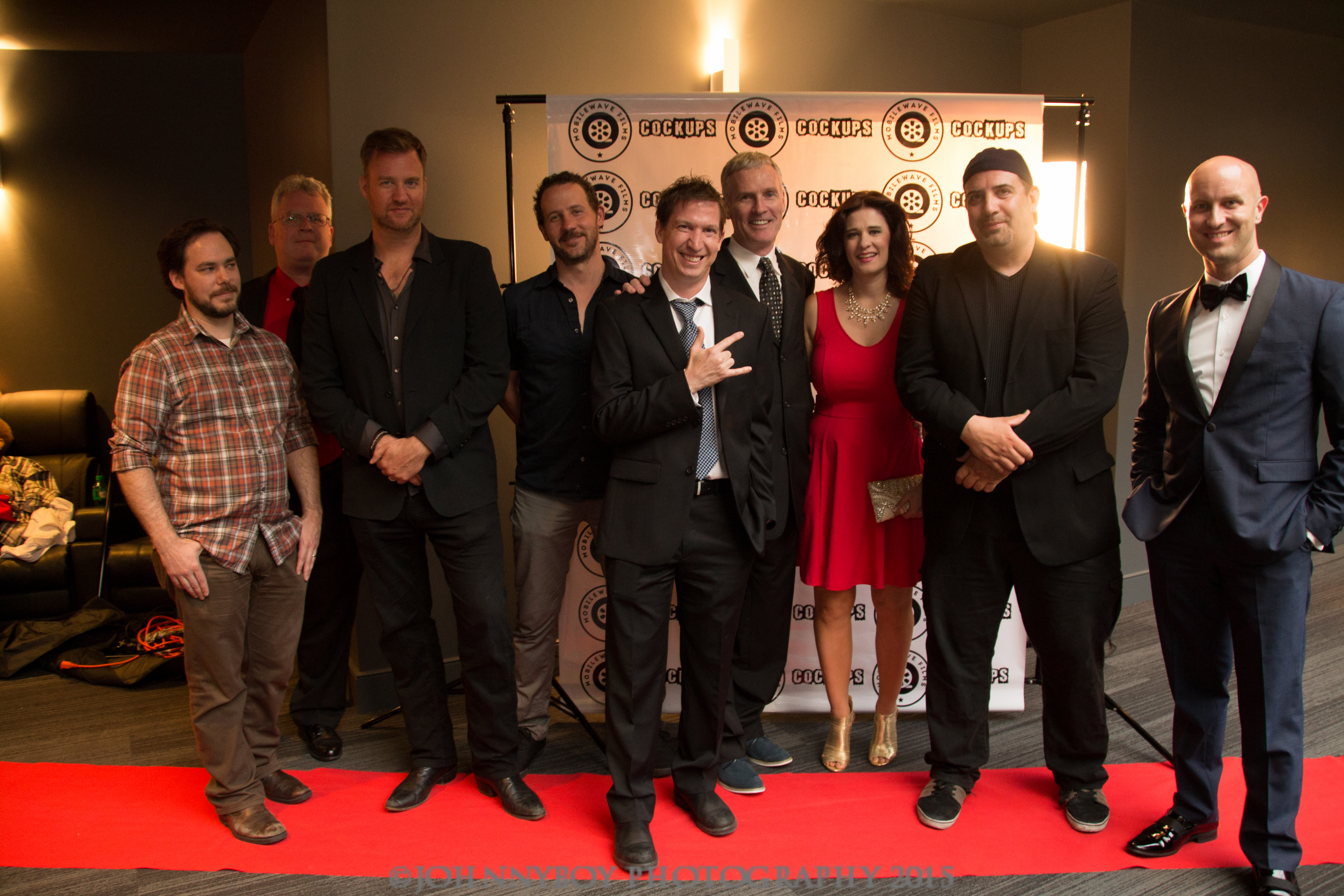 Director and actor Gerard Jamroz with cast and crew of The Cockups Movie