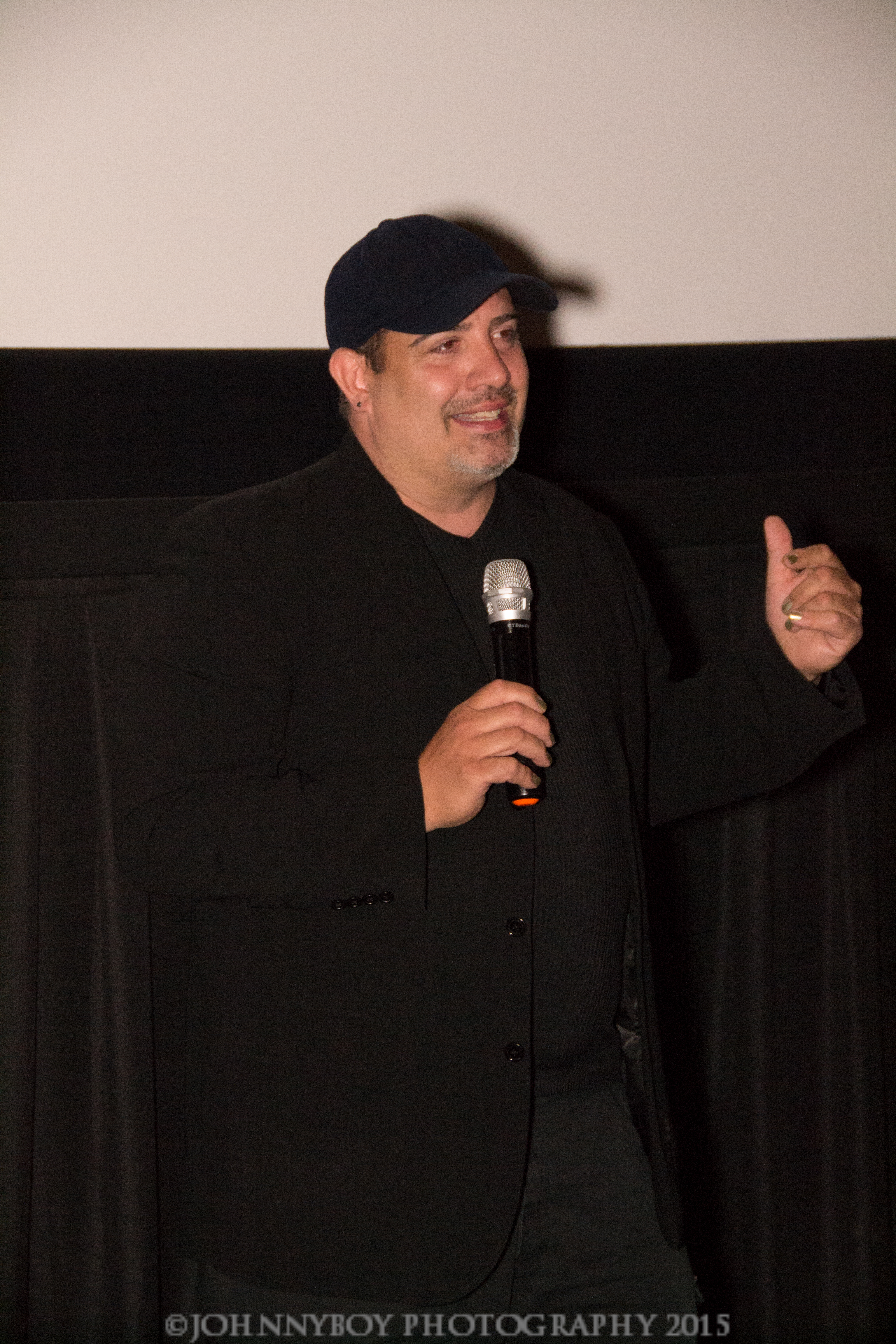 Director (T) Gerard Jamroz answers questions at a post-screening Q&A.