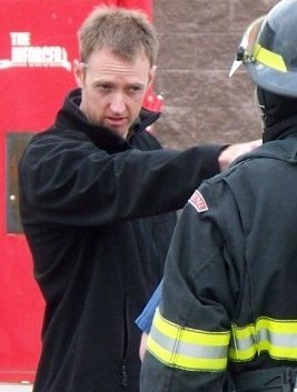 Joshua Denhardt directing on the set of The Volunteers