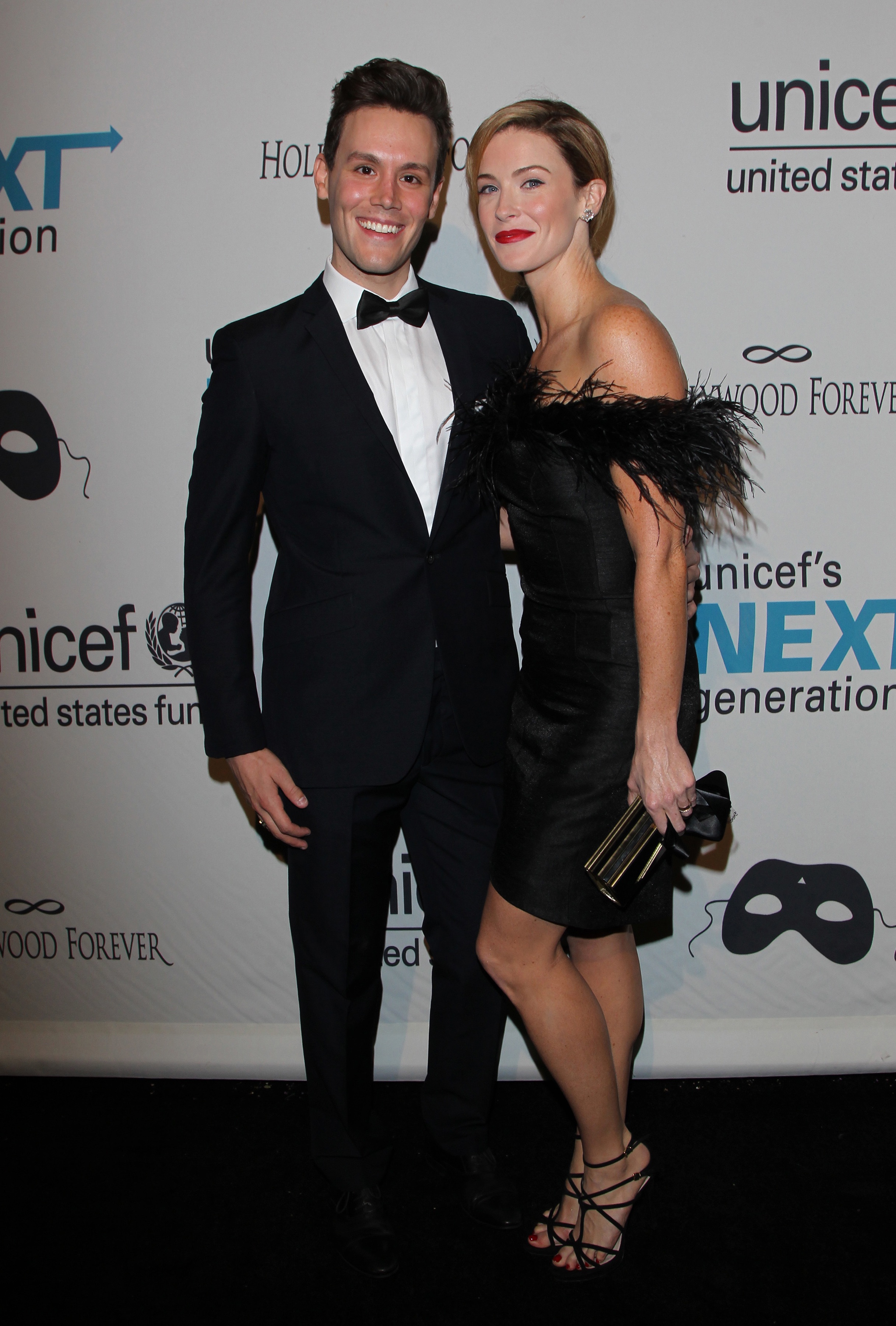 Television host Matthew Hoffman and actress Bridget Regan attend UNICEF's Next Generation's 2nd Annual UNICEF Masquerade Ball at Hollywood Forever Cemetery