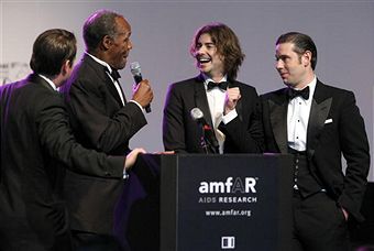 amfAR Cinema Against AIDS Dubai Gala. From left: Danny Glover and Victor Kubicek