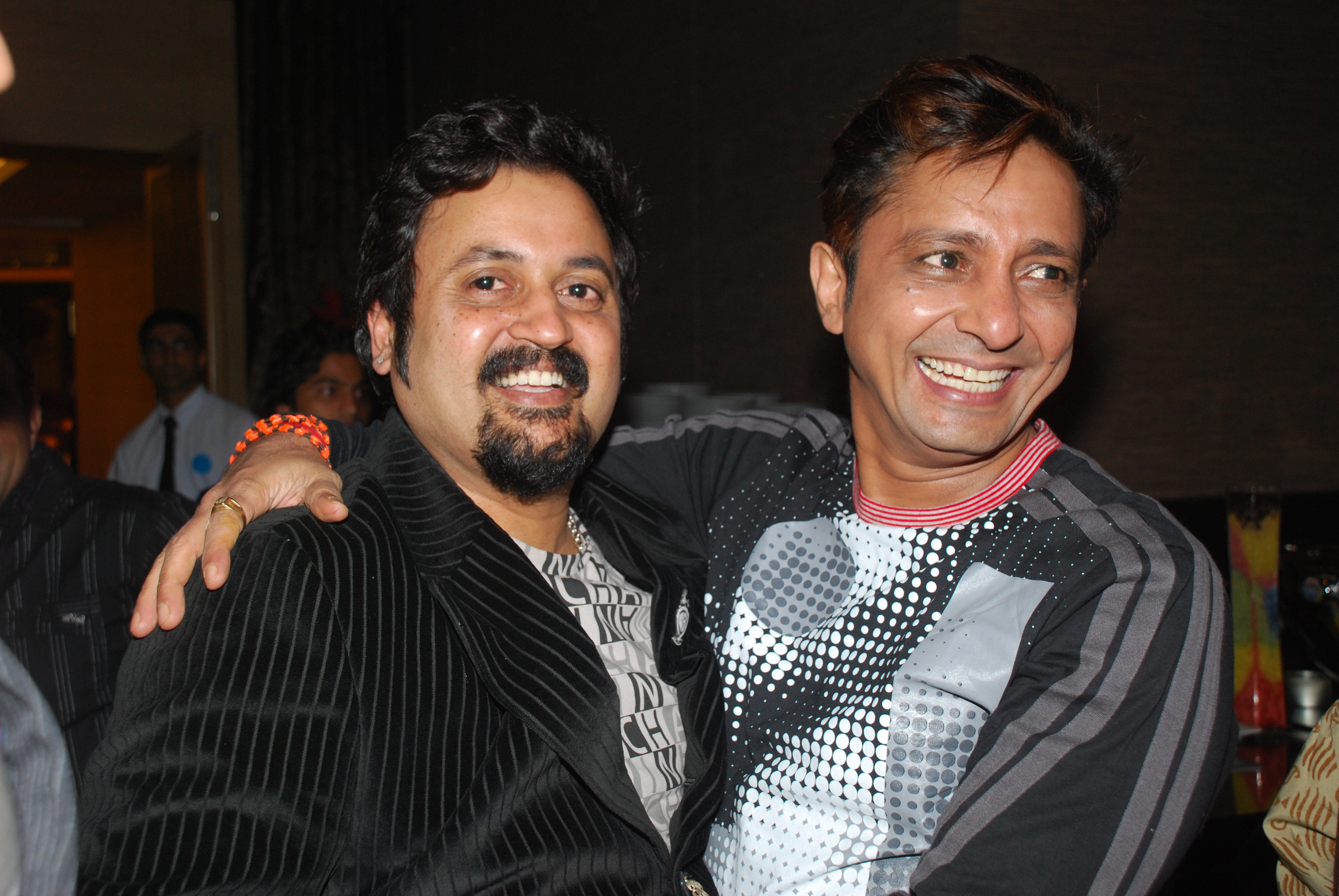 director rajeev khandelwal with singer sukhwinder singh
