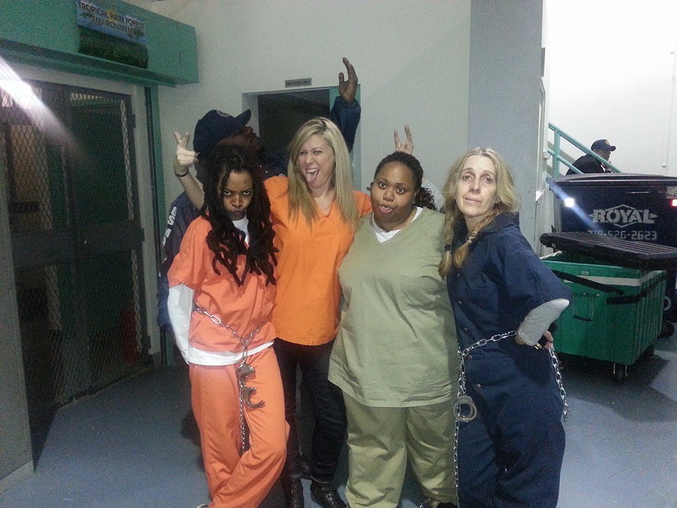 Between takes on the set of Orange is the New Black