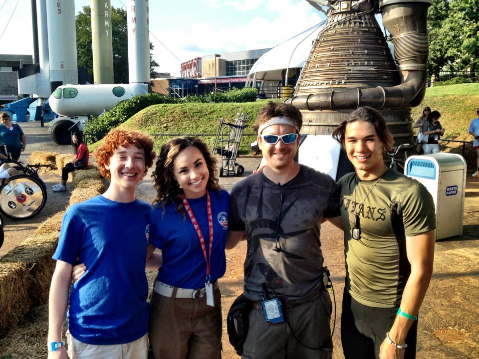 Jon Sawa on the set of Space Warriors with some of the cast.