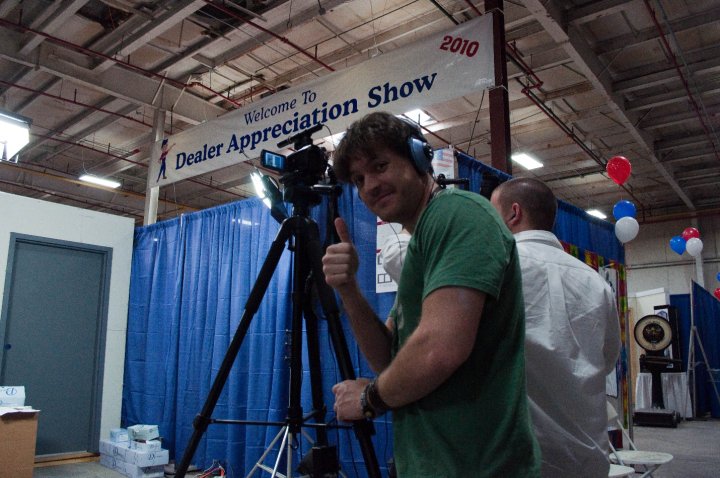 Jon Sawa shooting video at a trade show