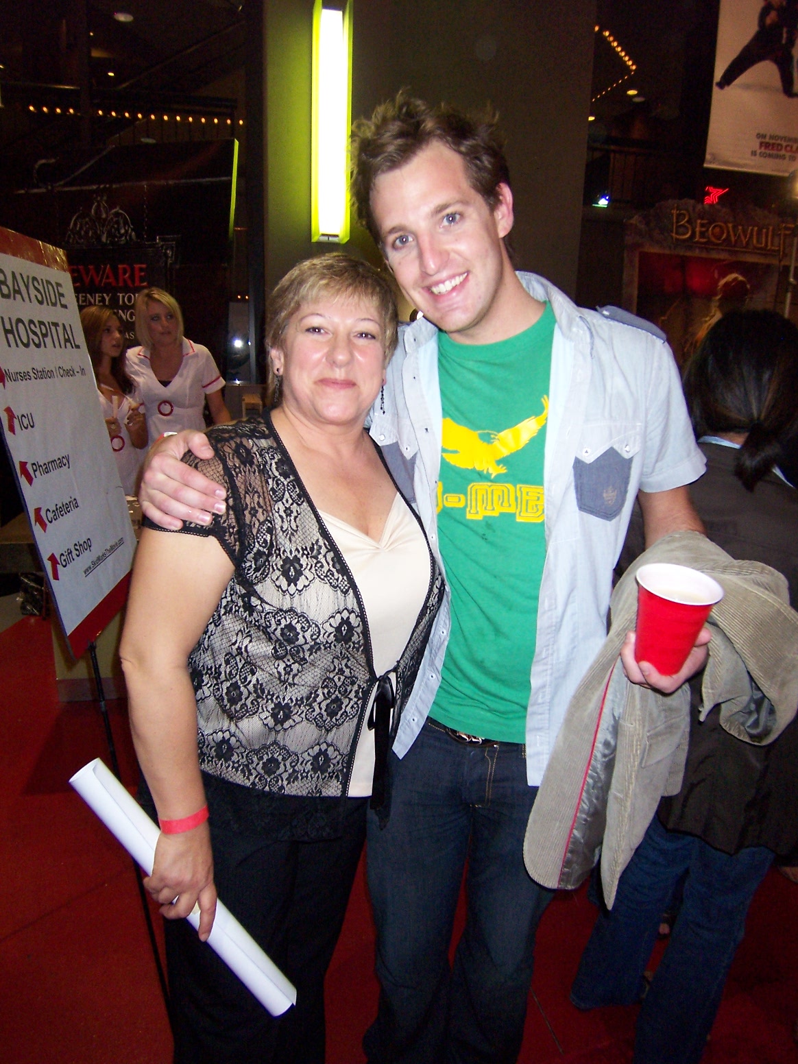 Tyler Poelle (Skid Marks, Scrubs, Undercover, Love or Whatever) and co-star Jeri Holst in the theatre lobby after their red carpet entrance.