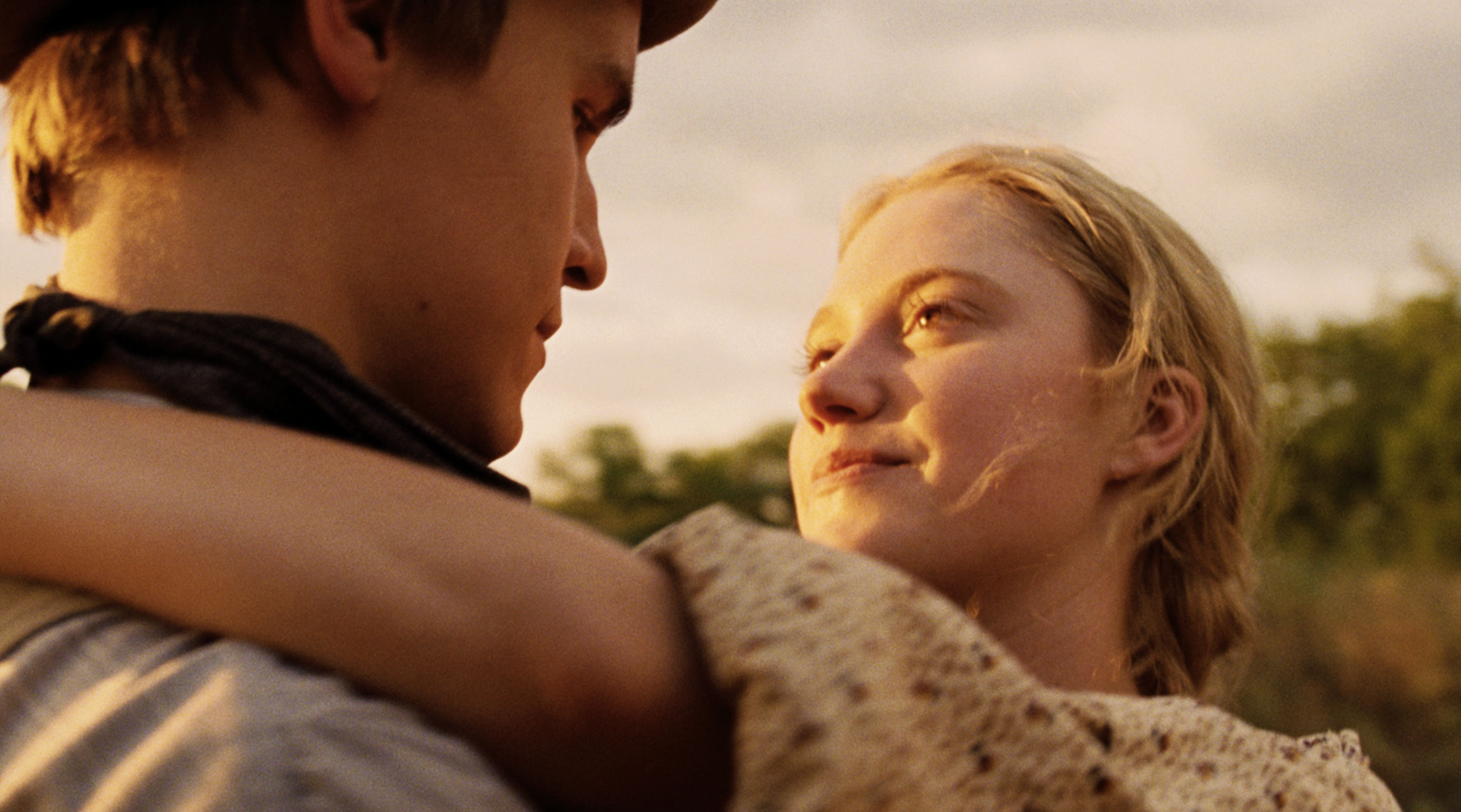 Still of Rhys Wakefield and Maika Monroe in Echoes of War (2015)