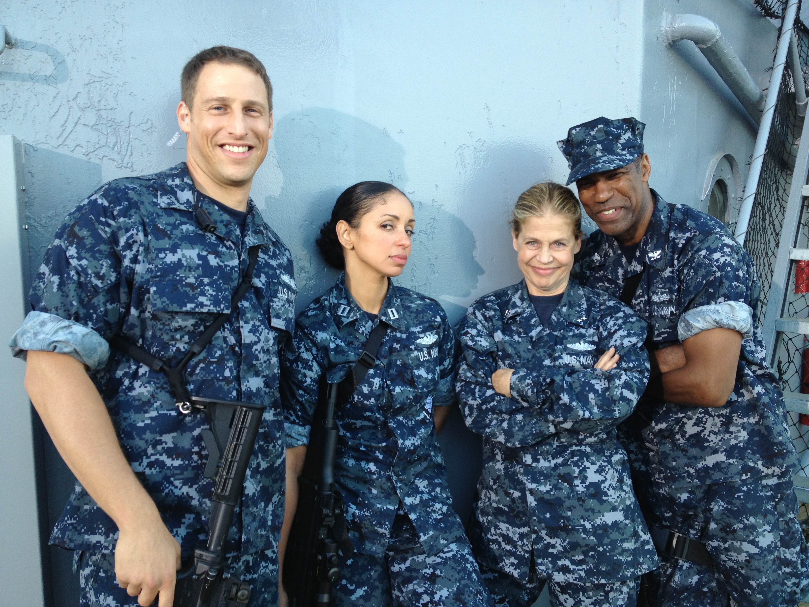 Craig Blair, Linda Hamilton, Mya Harrison, and Ricco Ross on the set of Dark Rising