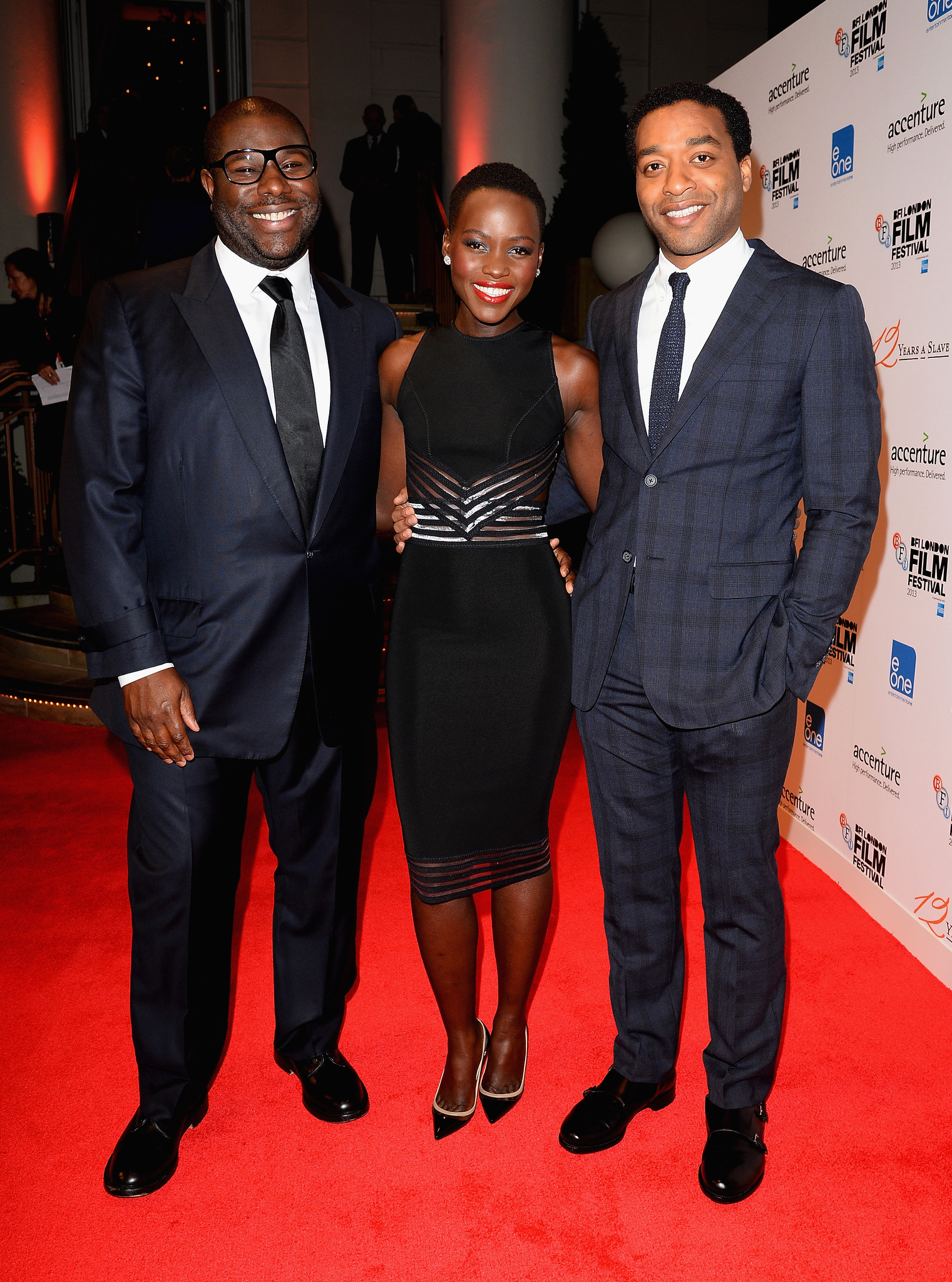 Chiwetel Ejiofor, Lupita Nyong'o and Steve McQueen at event of 12 vergoves metu (2013)