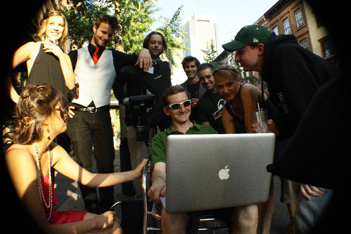 Swing 46 commercials: cast & crew gathered around for some dailies.