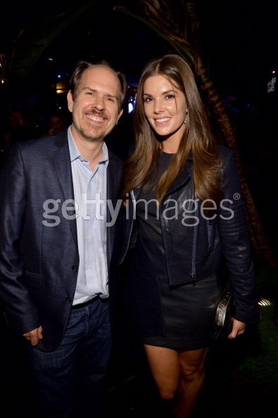 HOLLYWOOD, CA - FEBRUARY 11: Director Josh Stolberg (L) and actress Nikki Moore attend the 'The Hungover Games' cast party at Lure on February 11, 2014 in Hollywood, California. (Photo by Michael Buckner/Getty Images for Sony Pictures Home Entertainment)