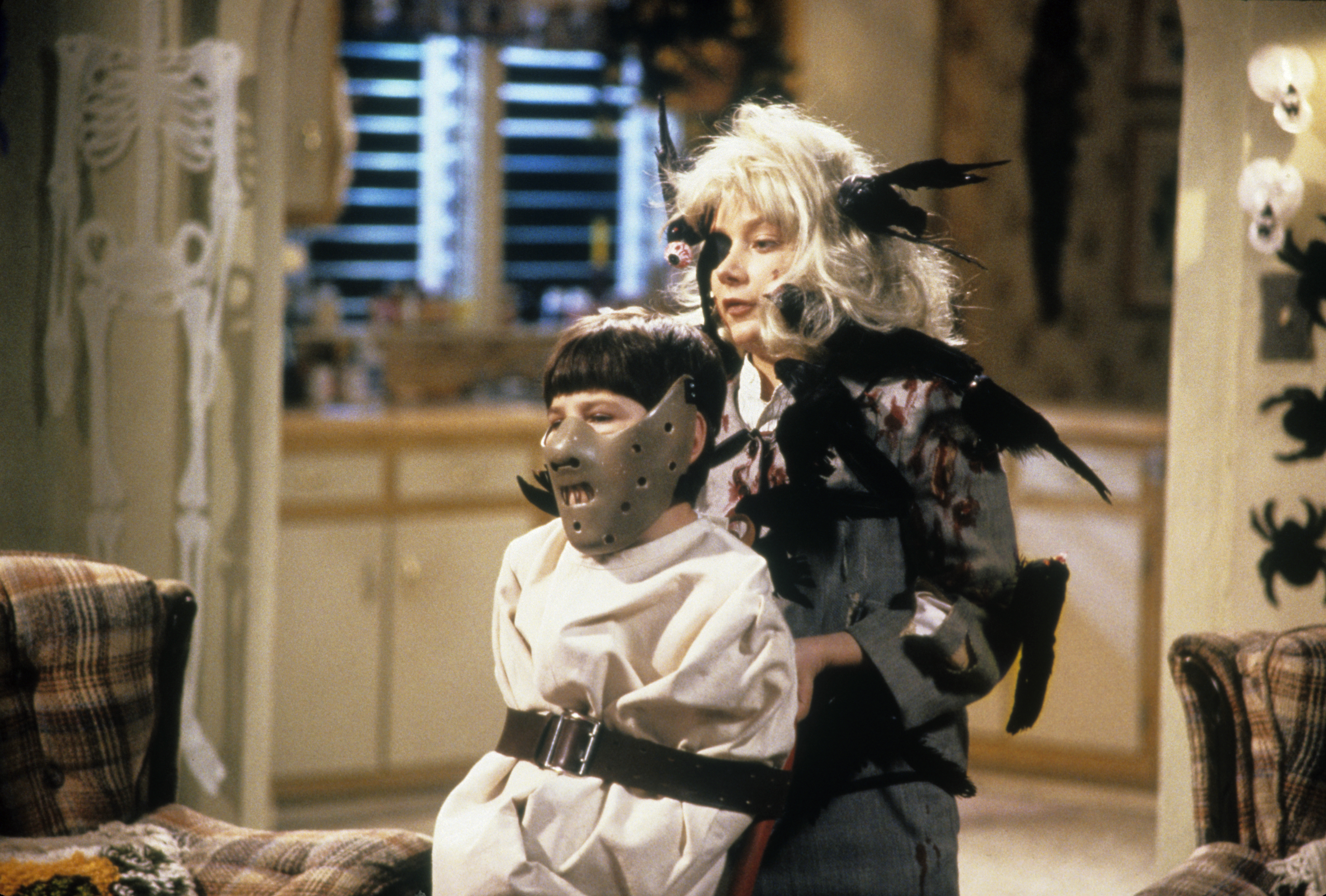 Still of Sara Gilbert and Michael Fishman in Roseanne (1988)