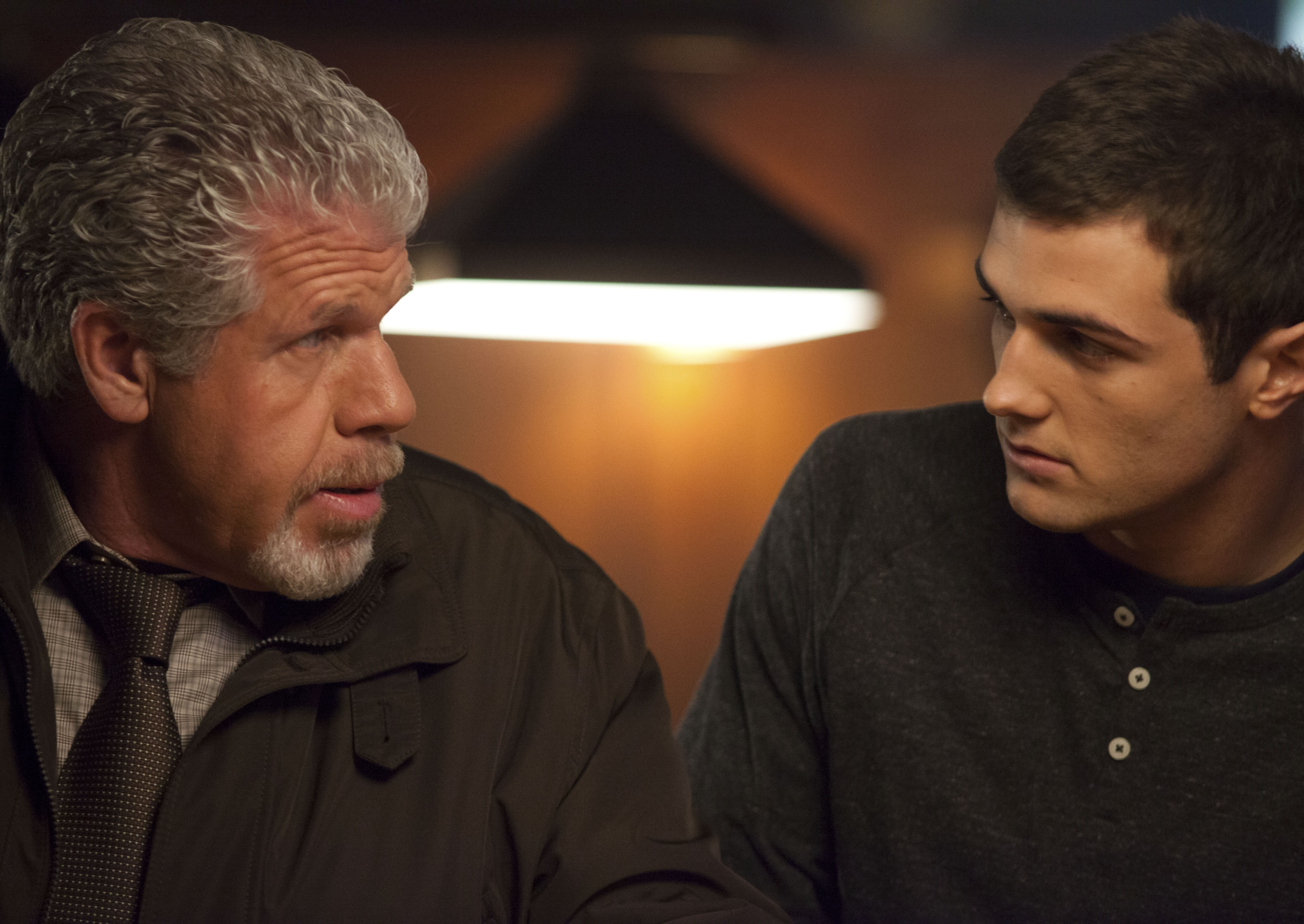 Still of Ron Perlman and Beau Mirchoff in Poker Night (2014)