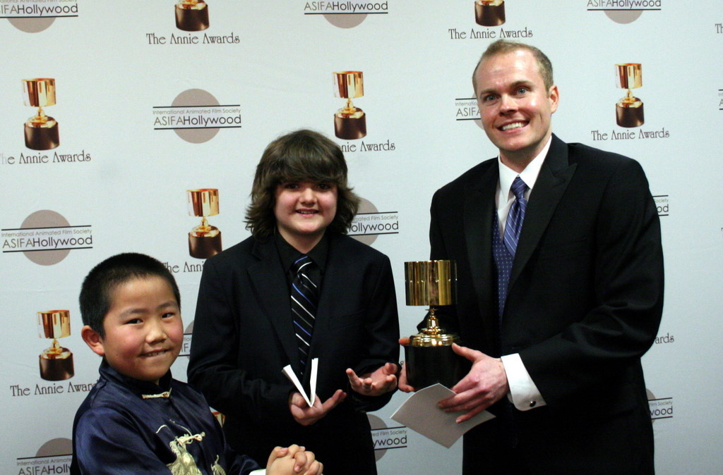 Presenters Perry Chen and Nicky Jones with feature character design winner Shane Prigmore