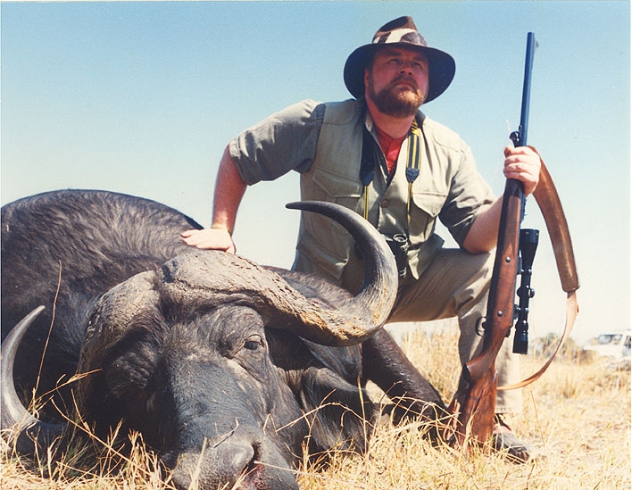 BUCK McNEELY WITH CAPE BUFFALO HE HUNTED IN BOTSWANA AFRICA.