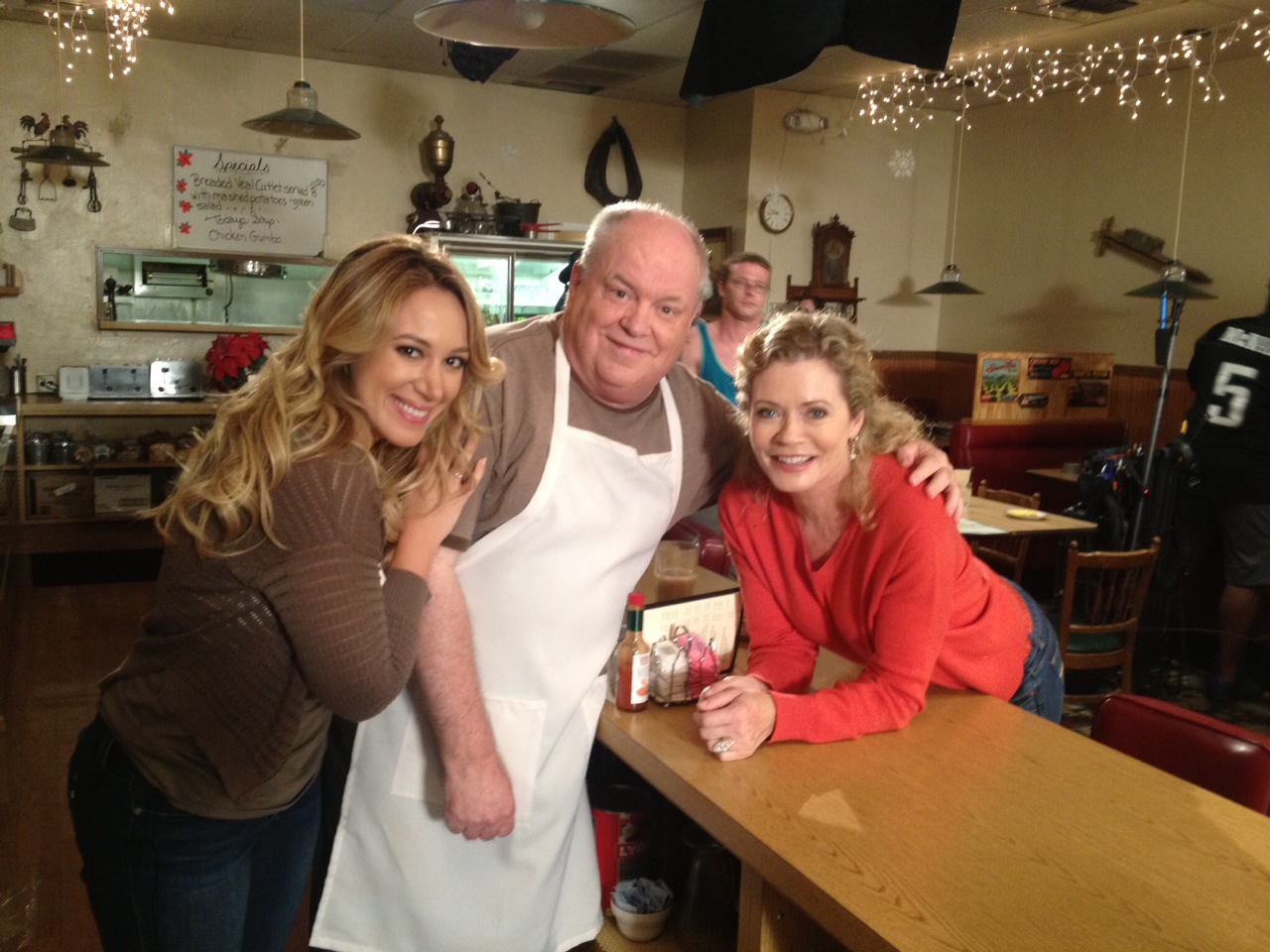 Jerry Hauck the set of 'Christmas Belle' (2013) with Haylie Duff (L) and Sheree J. Wilson (R).