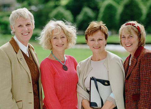 Legendary actresses Helen Mirren (center left) and Julie Walters (center right) pose with the inspirations for their characters: two of the original 