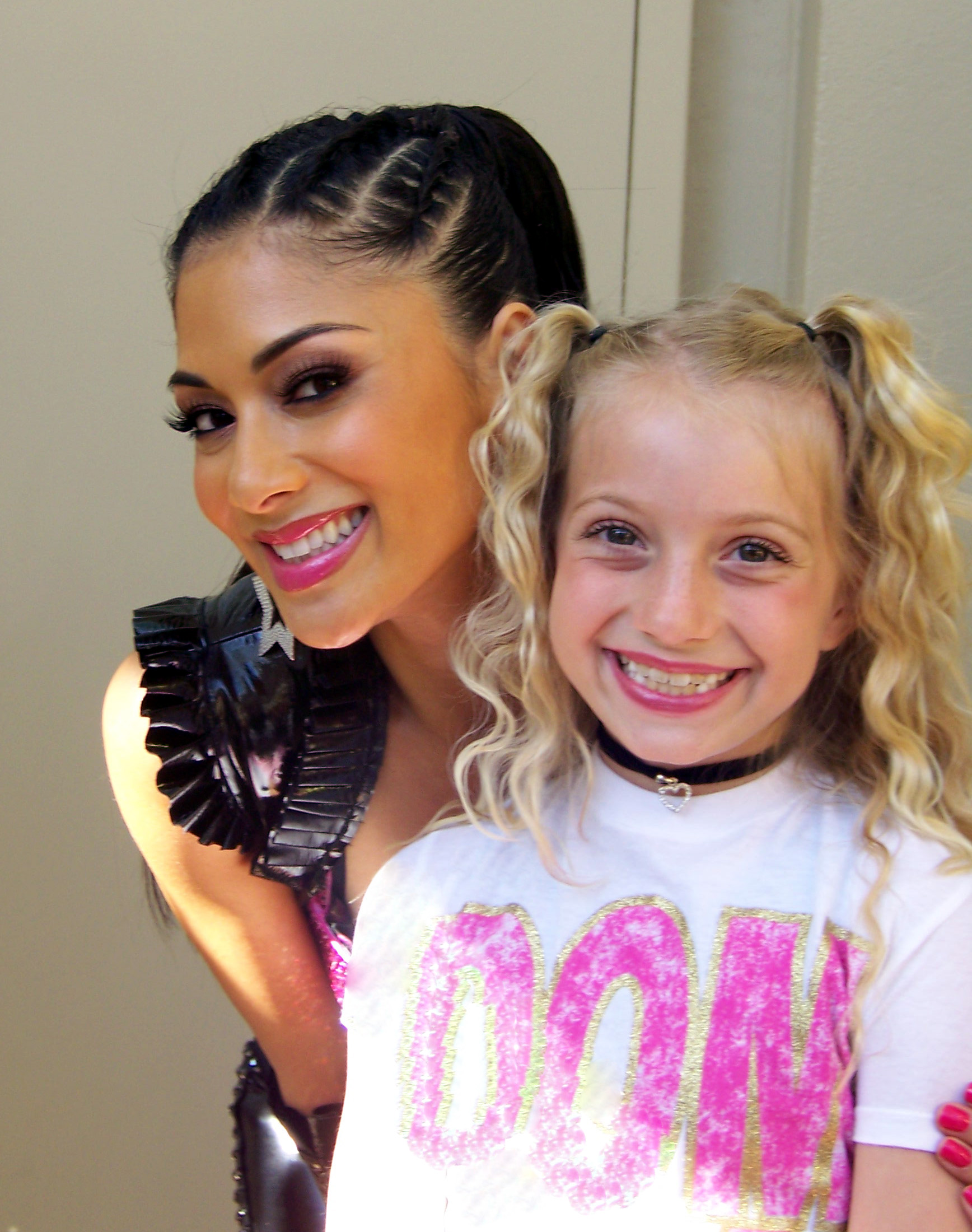 Posing with Nicole Scherzinger of the Pussycat Dolls before performing with them at the Kids Choice Awards '09.
