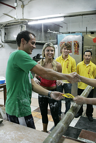 Still of Danielle Turner and Eric Sanchez in The Amazing Race: Good Doing Business with You (2007)