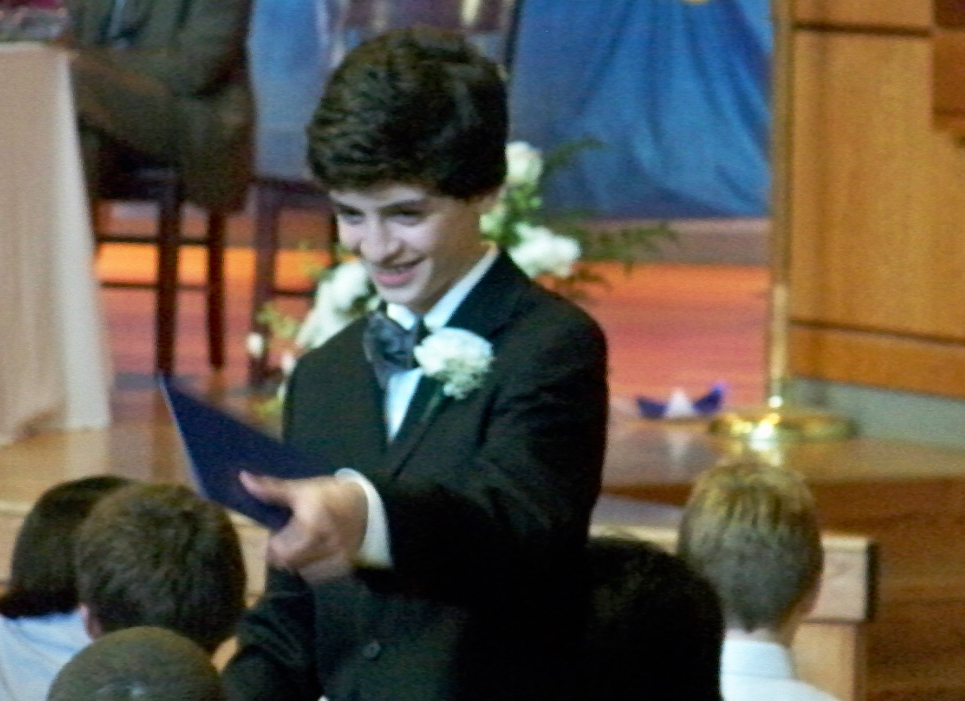 Received the Good Citizenship Award. John Rebello, 8th grade graduation, 2009