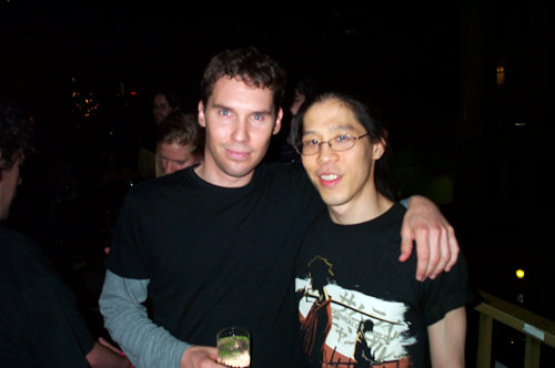 Bryan Singer and Justin Chung pose for a photo at a San Diego Comic-Con International 2006 after-hours party hosted by Dark Horse Comics and Gentle Giant.