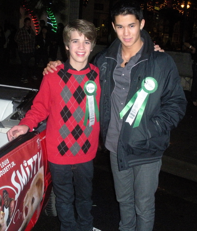 Brandon & Booboo Stewart riding in the Huntington Park Christmas Lane Parade.