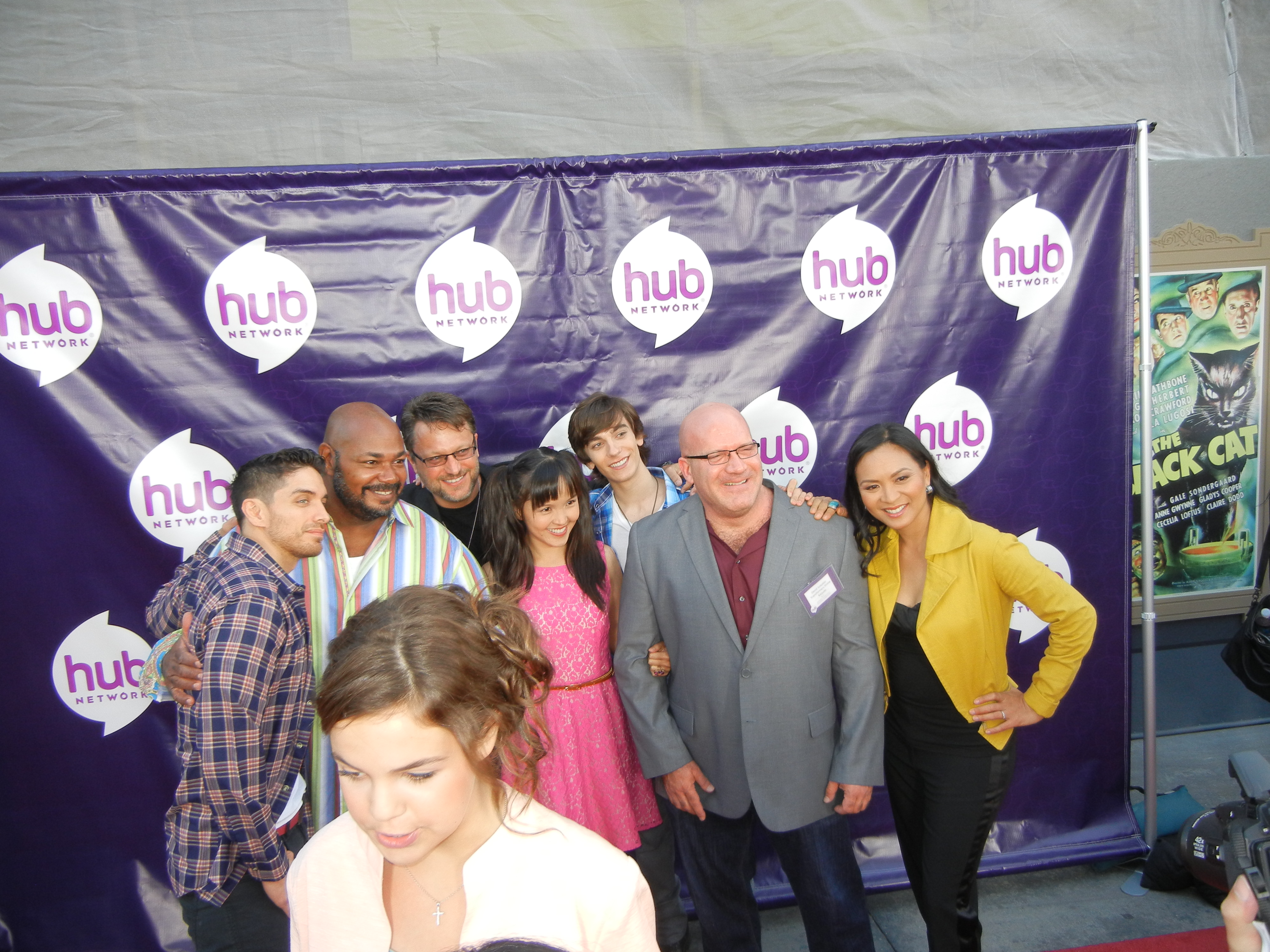 Andy Pessoa with other cast on the Red Carpet, Red Carpet HUB Press Tour 2013, (Bailee Madison forefront)Universal Studios, 7/26/13.