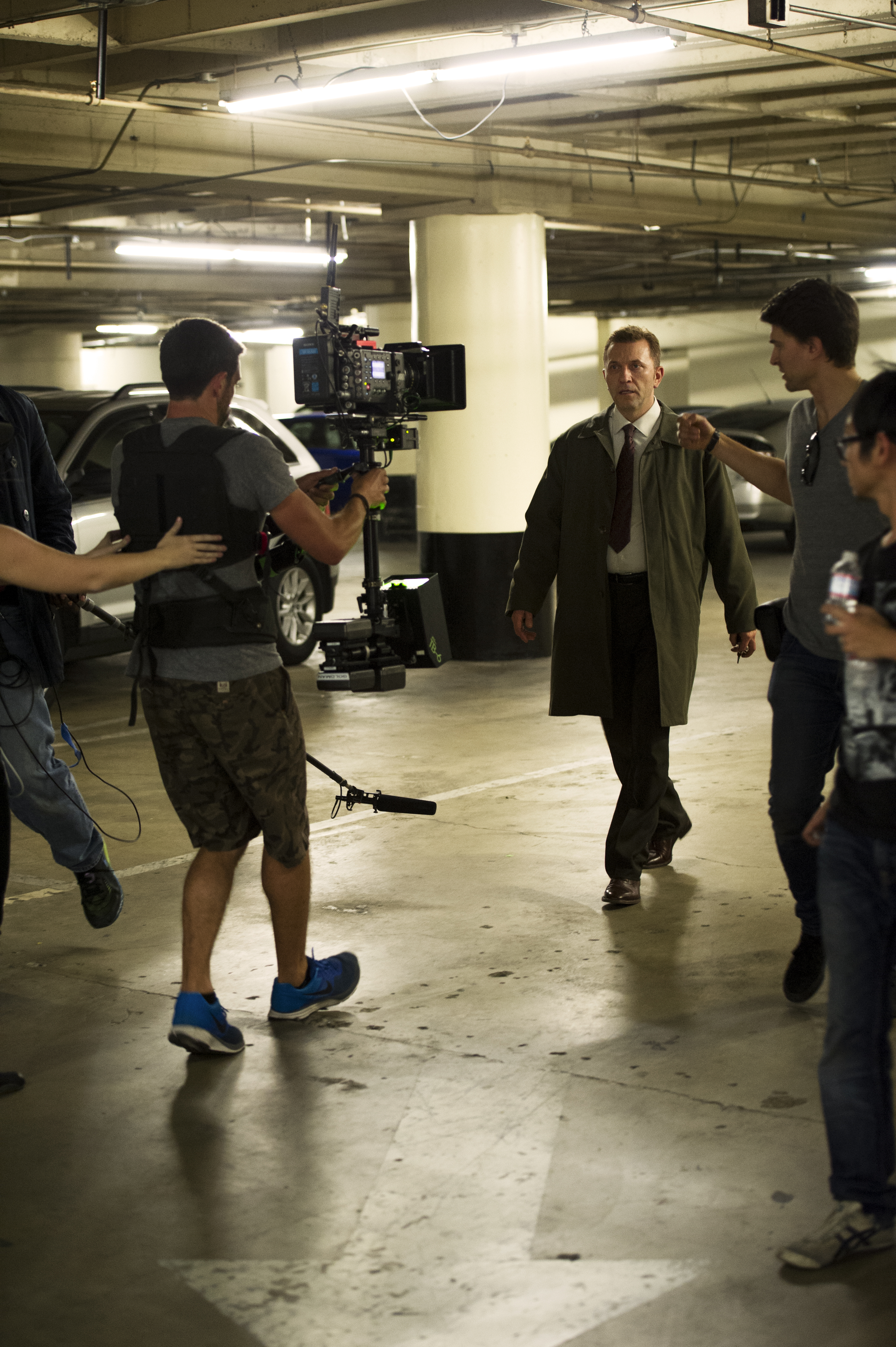 Paul Kowalski (far right), directing actor, Kristof Konrad, on the set of 