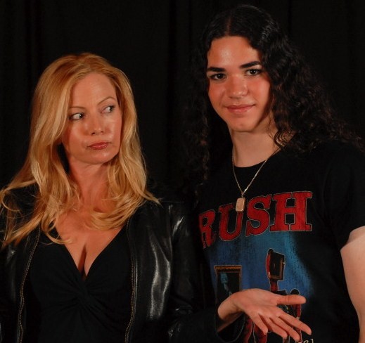 Ronnie Connell with Traci Lords at the reading table for 