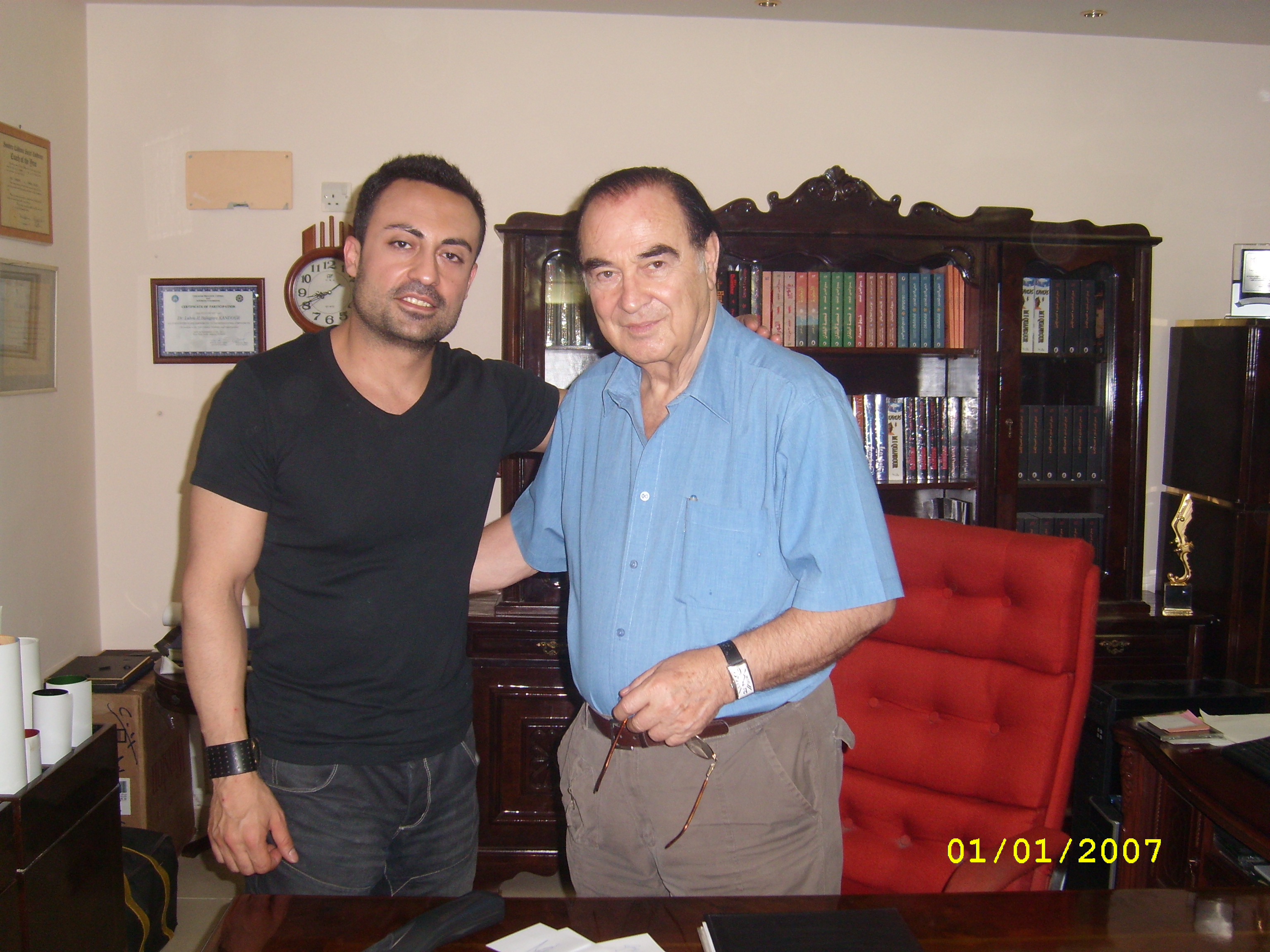 With director Mohydeen Quandour in the office.