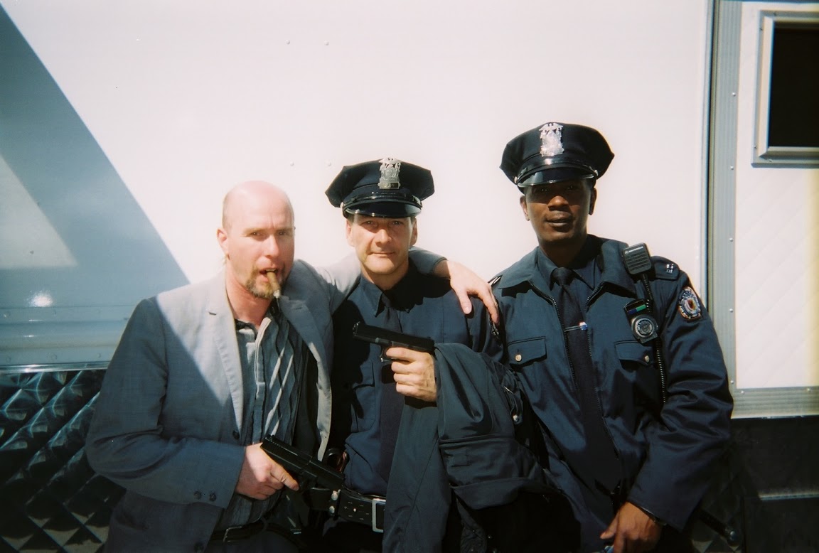 David Fultz with Gothams finest on the set of The Dark Knight.