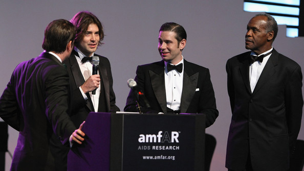 amfAR Cinema Against AIDS Dubai Gala. From left: Victor Kent Kubicek, Derek Anderson and Danny Glover.