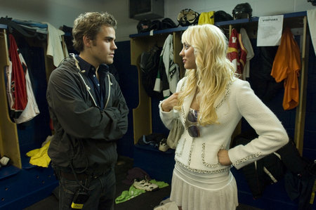 Paul Wesley as JAKE TANNER and Kaley Cuoco as BLANCA CHAMPION in a scene from KILLER MOVIE.