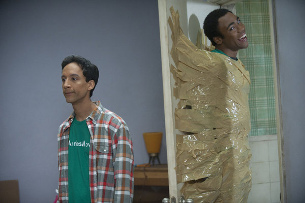 Still of Danny Pudi and Donald Glover in Community (2009)