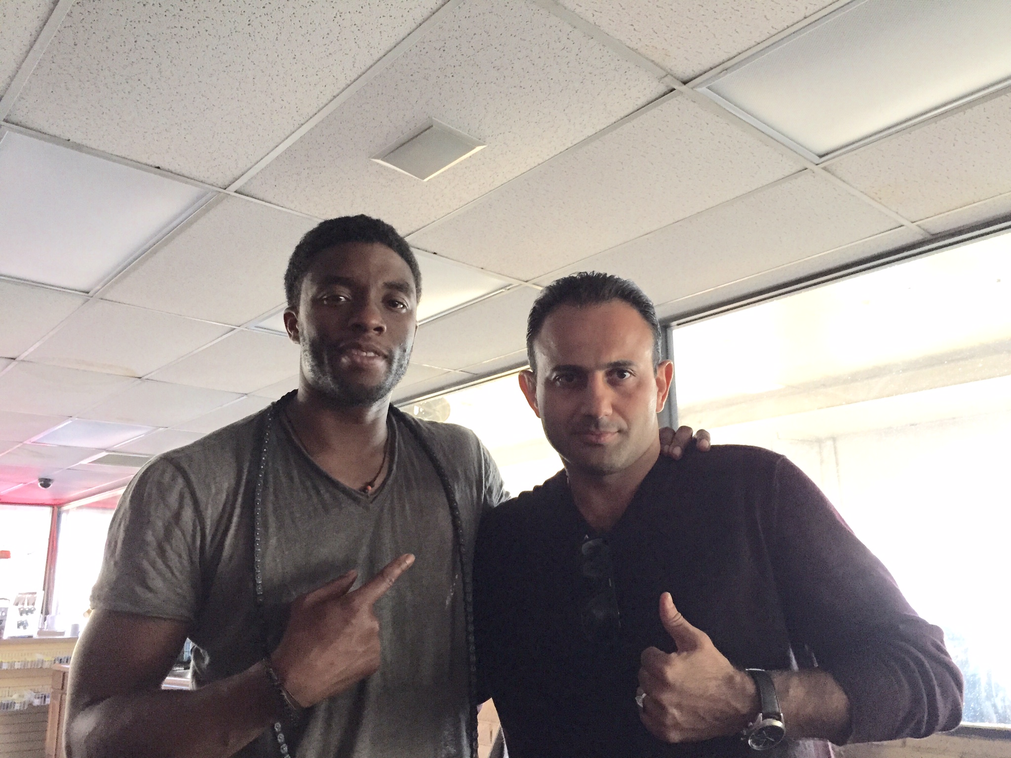 Roman Mitichyan with actor Chadwick Boseman in Message From the King.