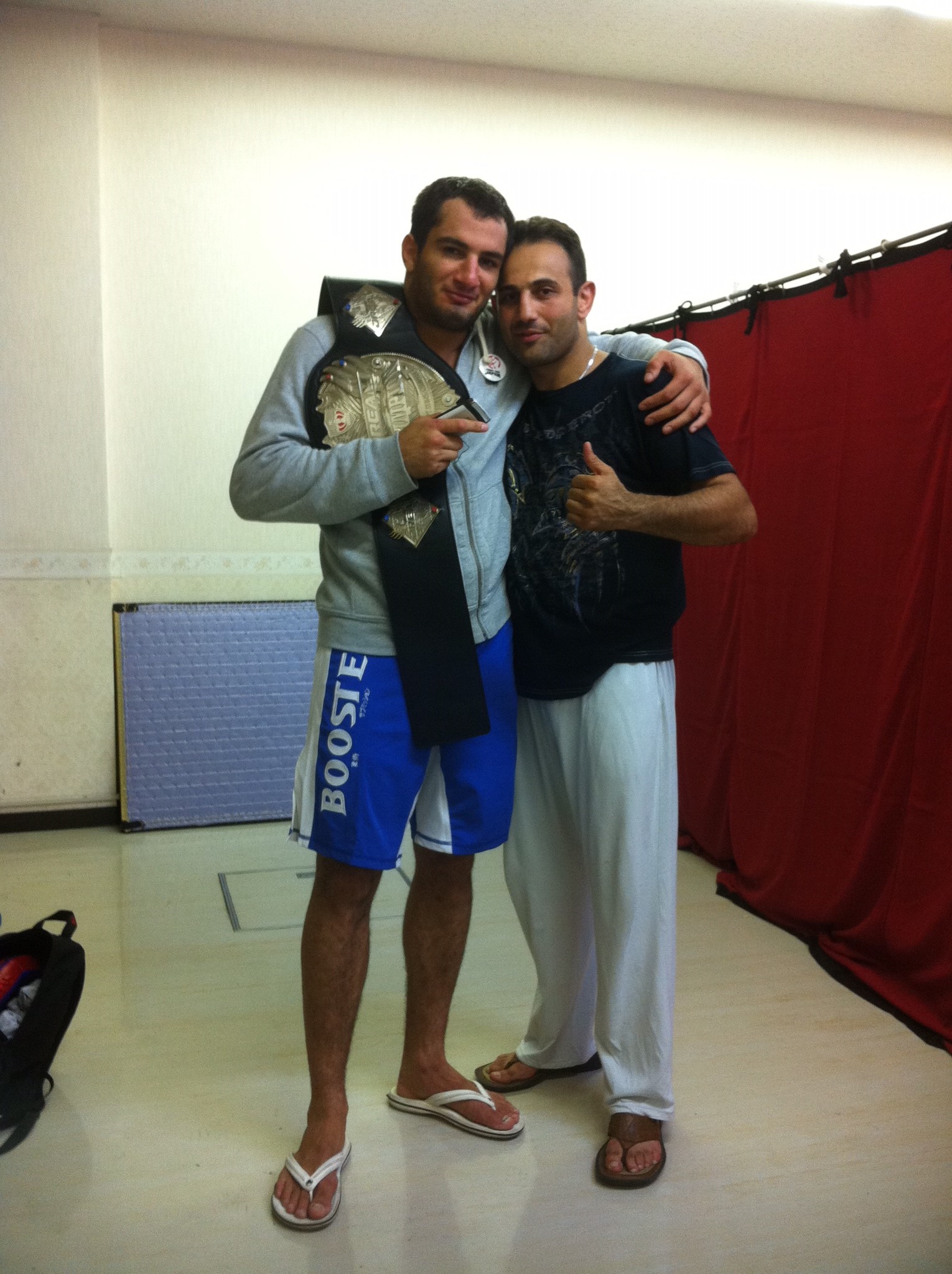 Roman Mitichyan with MMA fighter Gregard Mousassi in Japan.