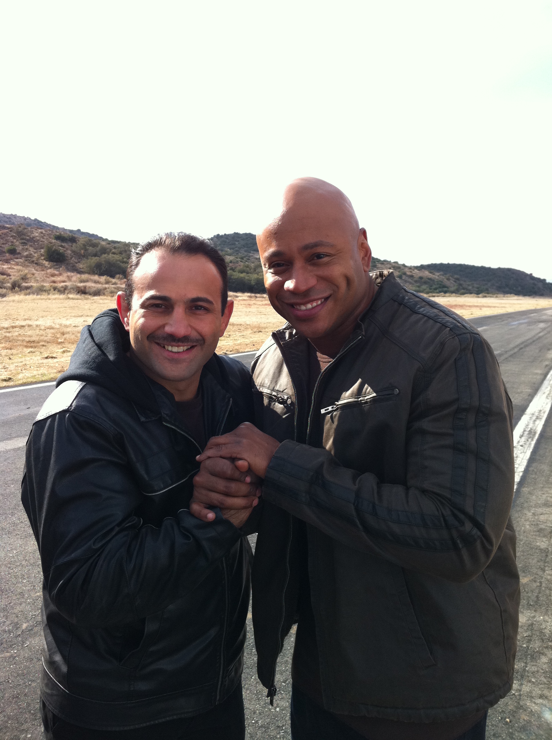Roman Mitichyan with actor LL Cool J in NCIS: LA.