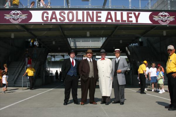 The Founding Four standing in Gasoline Alley at Indianapolis Motor Speedway. Centennial
