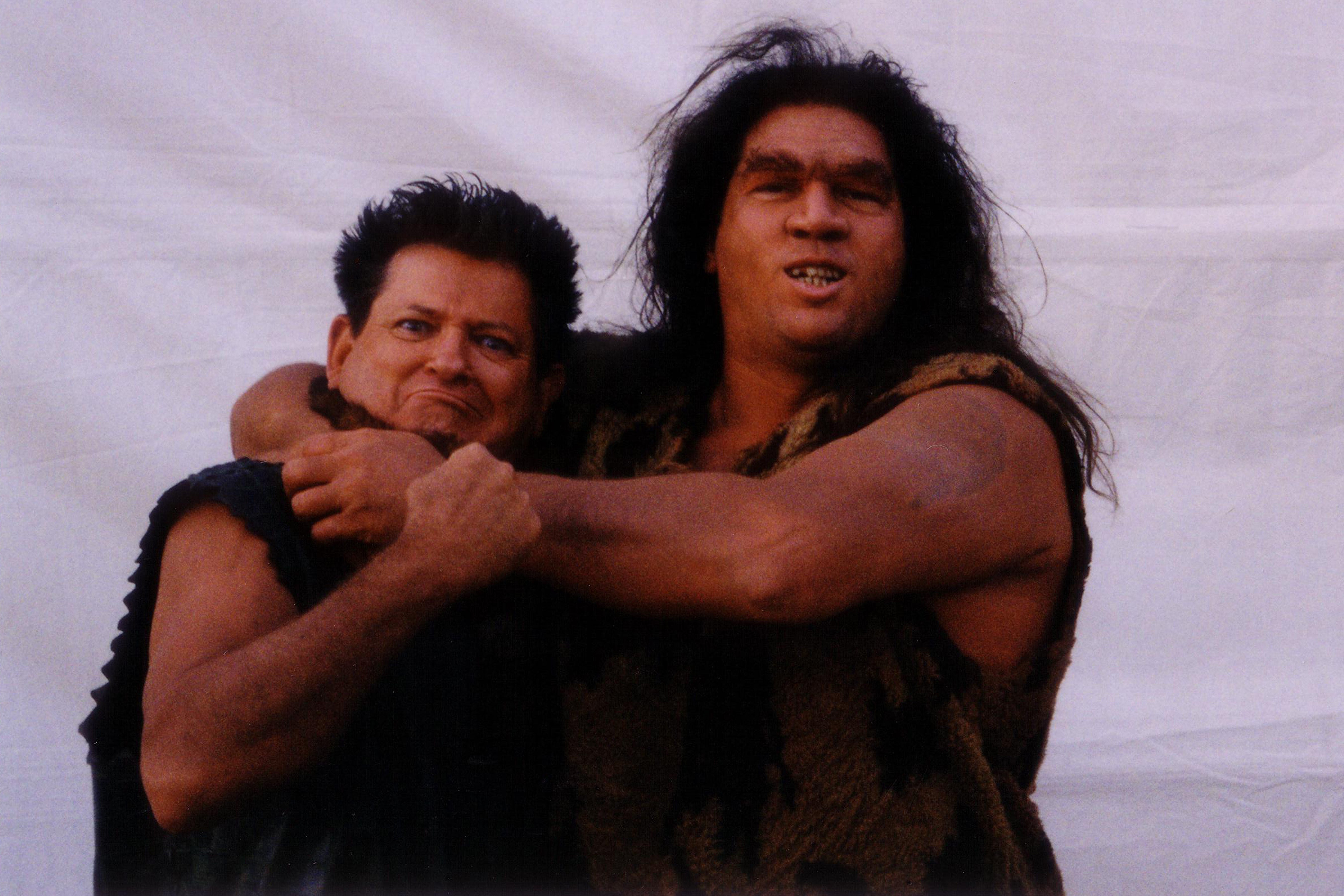 Seth as his Bronto King Patron character rough housing with one of the Neanderthals in the feature film The Flintstones in Viva Rock Vegas (2000)