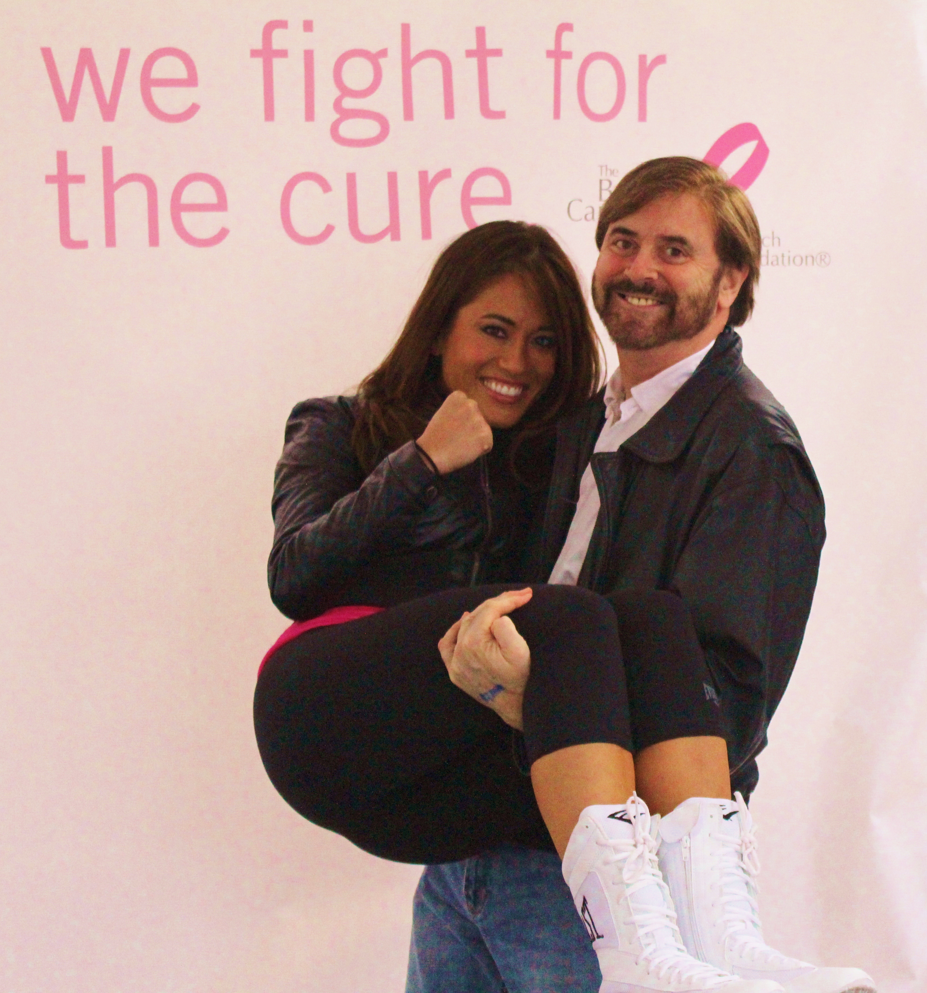 Seth literally supports Cara at Fight for the Cure for Breast Cancer, an event for Everlast.