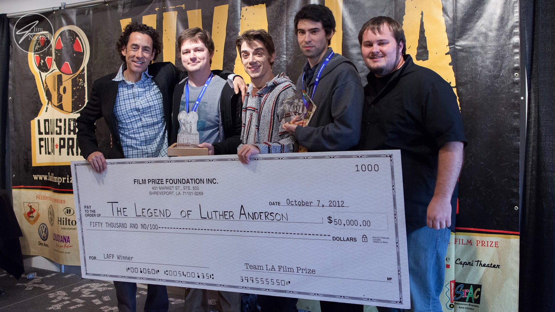 Executive Director Gregory Kallenberg (left) and Festival Director Chris Lyon (right) with filmmakers (left to right) Noah Scruggs, Chris Armand, and Thomas Woodruff at the awards ceremony for the Louisiana Film Prize 2012.