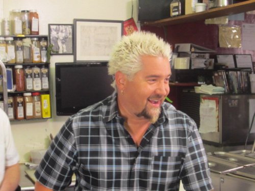 Still of Guy Fieri in Diners, Drive-ins and Dives (2006)