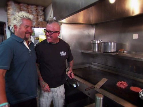 Still of Guy Fieri in Diners, Drive-ins and Dives (2006)