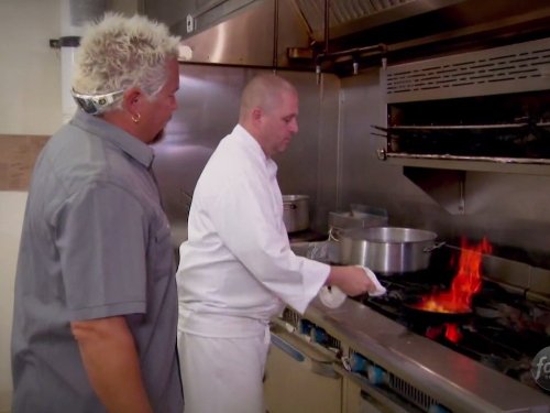 Still of Guy Fieri in Diners, Drive-ins and Dives (2006)