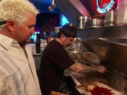 Still of Guy Fieri in Diners, Drive-ins and Dives (2006)