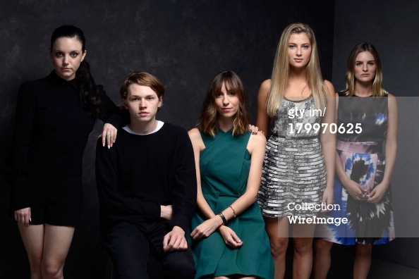 TORONTO, ON - SEPTEMBER 07: (L-R) Actress Claudia Levy, actor Jack Kilmer, director Gia Coppola, actress Zoe Levin and actress Nathalie Love of 'Palo Alto' pose at the Guess Portrait Studio during 2013 Toronto International Film Festival on Sept